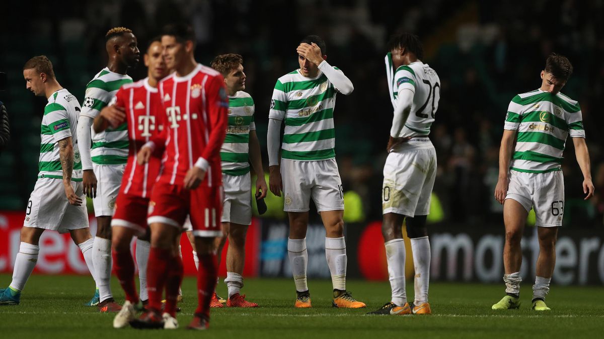 edryck Boyata, Tomas Rogic and Kieran Tierney of Celtic of Celtic react at full time during the UEFA Champions League group B match between Celtic FC and Bayern.