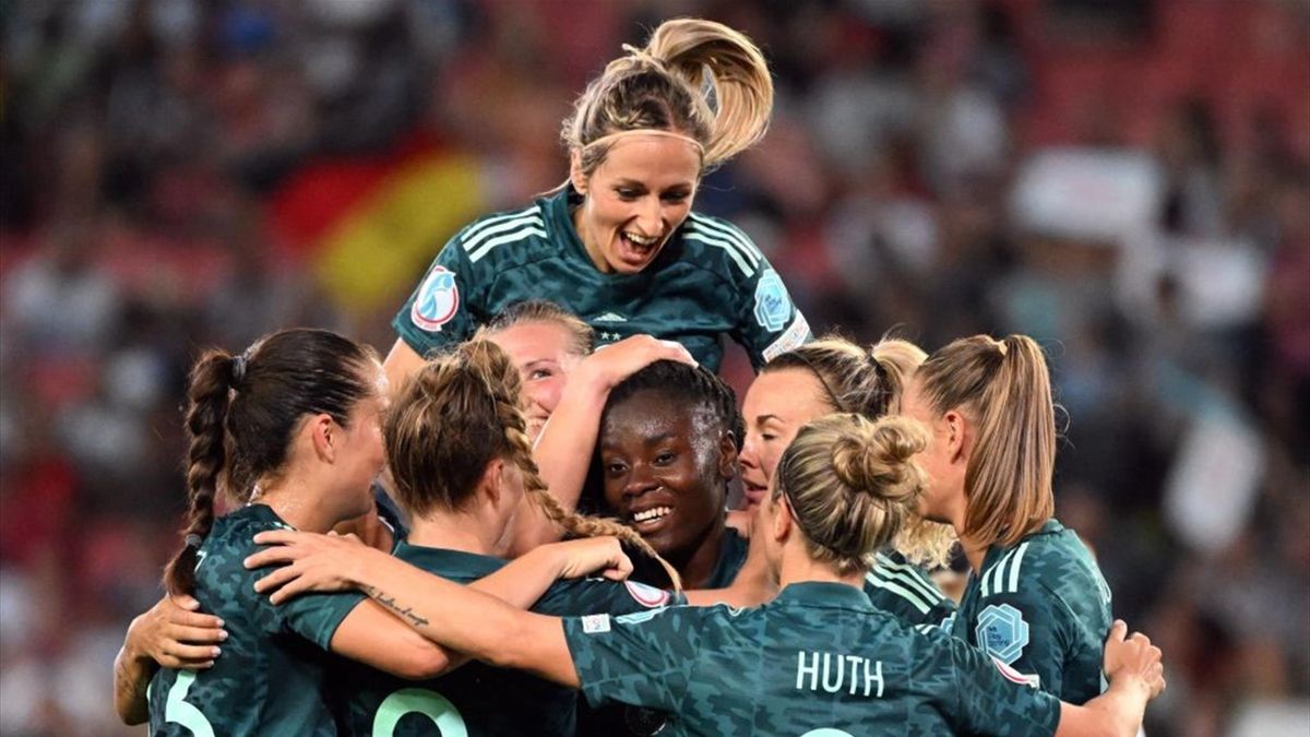 Germany's midfielder Nicole Anyomi (C) celebrates her team's third goal during the UEFA Women's Euro 2022 Group B football match between Finland and Germany