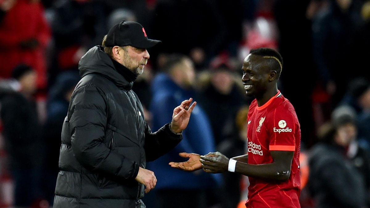 Jurgen Klopp manager of Liverpool with Sadio Mane of Liverpool at the end of the Premier League match between Liverpool and Leeds United at Anfield on February 23, 2022 in Liverpool, England. (Photo by Andrew Powell/Liverpool FC via Getty Images)