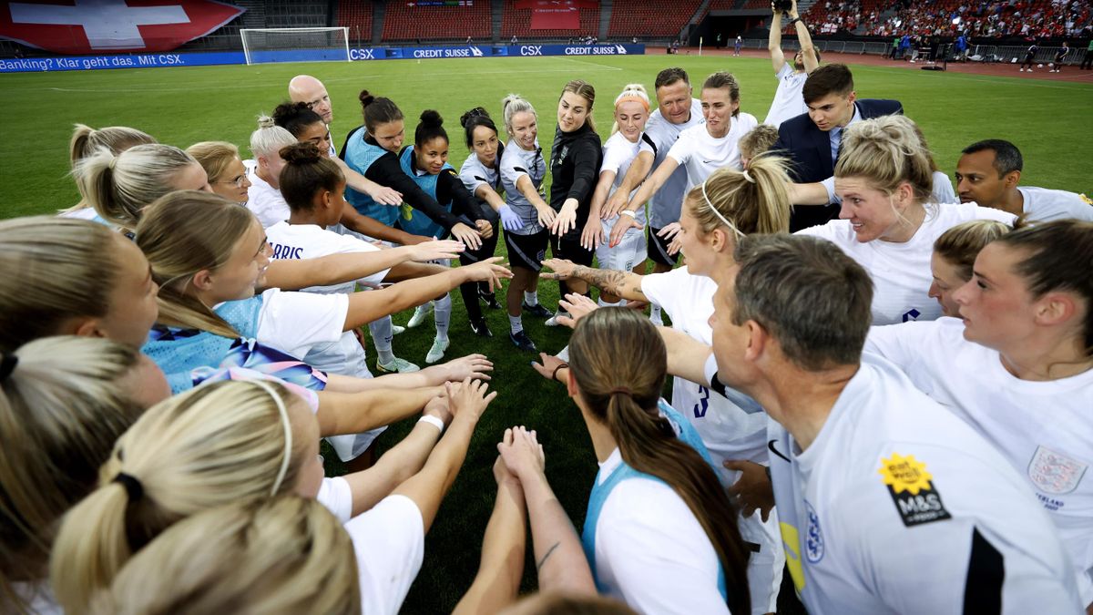 The England team celebrates their side's win as they huddle after the final whistle of the Women's International friendly match between Switzerland and England