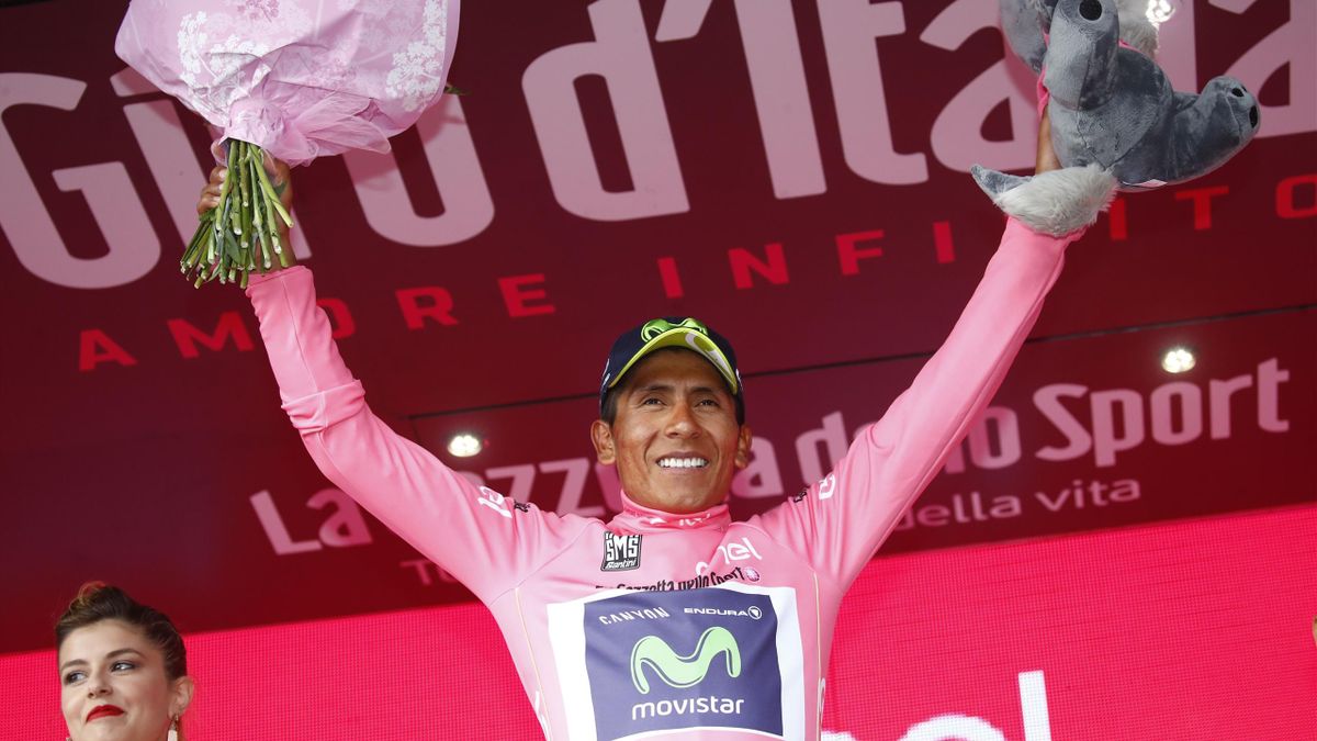 Colombia's Nairo Quintana of team Movistar celebrates the pink jersey of the overall leader on the podium after winning the 9th stage of the 100th Giro d'Italia, Tour of Italy, cycling race from Montenero di Bisaccia to Blockhaus on May 14, 2017. Colombia
