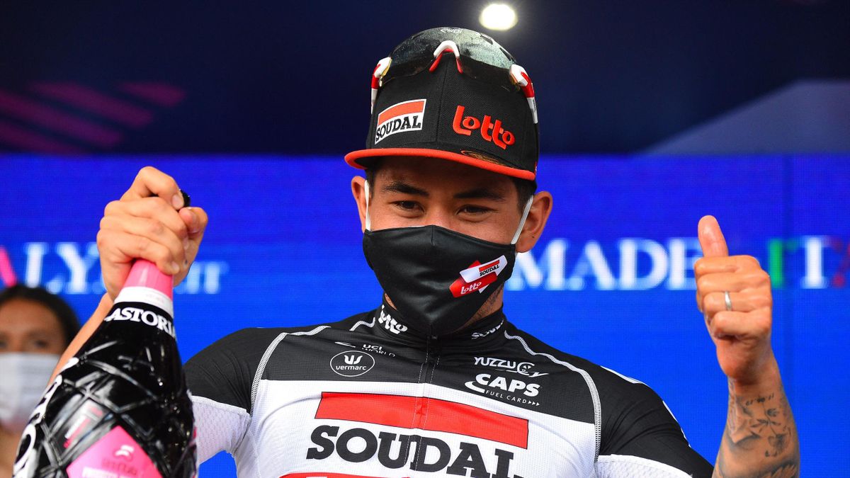 Team Lotto-Soudal rider Australia's Caleb Ewan celebrates his victory on the podium of the fifth stage of the Giro d'Italia 2021 cycling race, 177 km between Modena and Cattolica, Emilia-Romagna