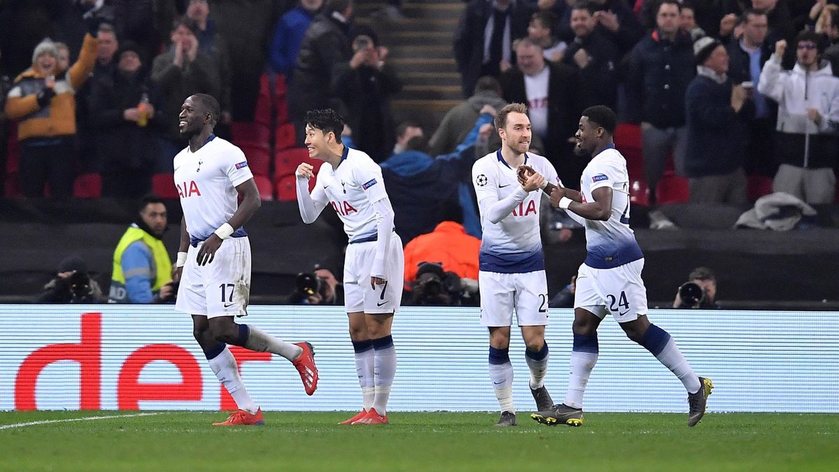 Football players of Tottenham Hotspur FC celebrate after Leung-Min Sun scored a goal during the UEFA Champions League Round of 16 First Leg match between Tottenham Hotspur and Borussia Dortmund at Wembley Stadium in London