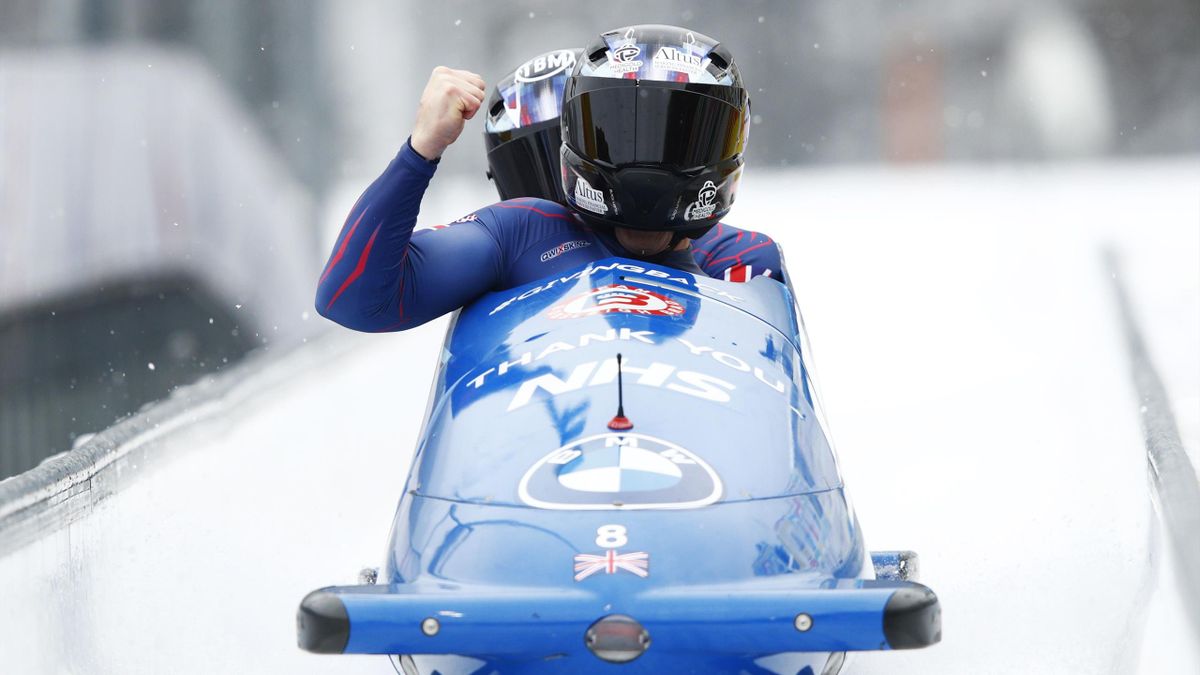 : Brad Hall and Greg Cackett of Great Britain celebrate a strong finish during the BMW IBSF 2-Man bobsleigh World Cup Koenigssee at LOTTO Bayern Eisarena Koenigssee on January 23, 2021