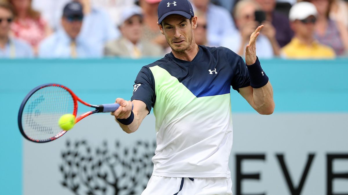 Andy Murray of Great Britain plays a forehand during his match against Nick Kyrgios of Australia on Day Two of the Fever-Tree Championships at Queens Club on June 19, 2018 in London.