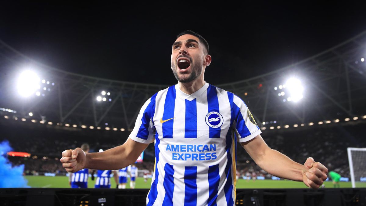 Neal Maupay of Brighton celebrates after scoring his sides first goal during the Premier League match between West Ham United and Brighton & Hove Albion at London Stadium on December 01, 2021 in London, England.