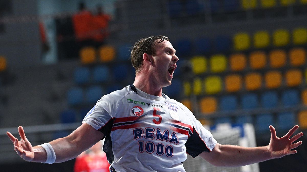 Norway's left back Sander Sagosen celebrates their victory at the end of the 2021 World Men's Handball Championship match between Group III teams Iceland and Norway at the 6th of October Sports Hall in 6th of October city, a suburb of the Egyptian capital