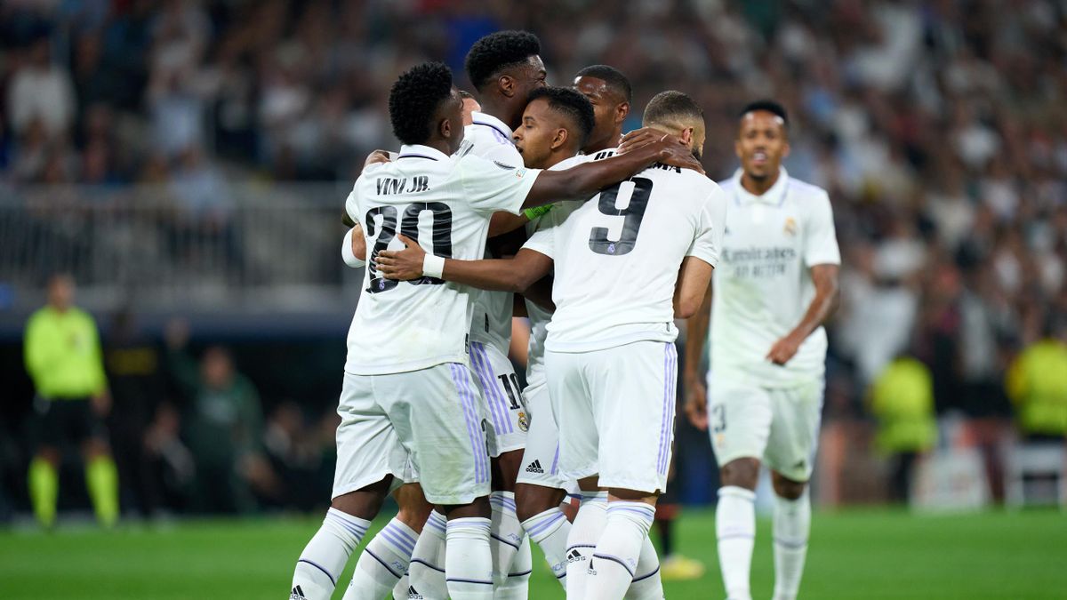 MADRID, SPAIN - OCTOBER 05: Rodrygo Goes of Real Madrid celebrates teammates after scoring the opening goal during the UEFA Champions League group F match between Real Madrid and Shakhtar Donetsk at Estadio Santiago Bernabeu on October 05, 2022 in Madrid,