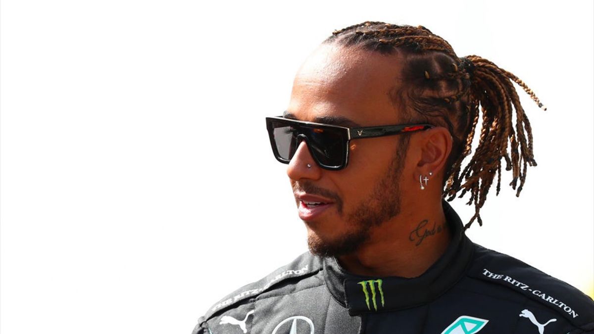 Lewis Hamilton of Great Britain and Mercedes GP walks on the grid during Day One of F1 Testing at Bahrain International Circuit on March 12, 2021 in Bahrain