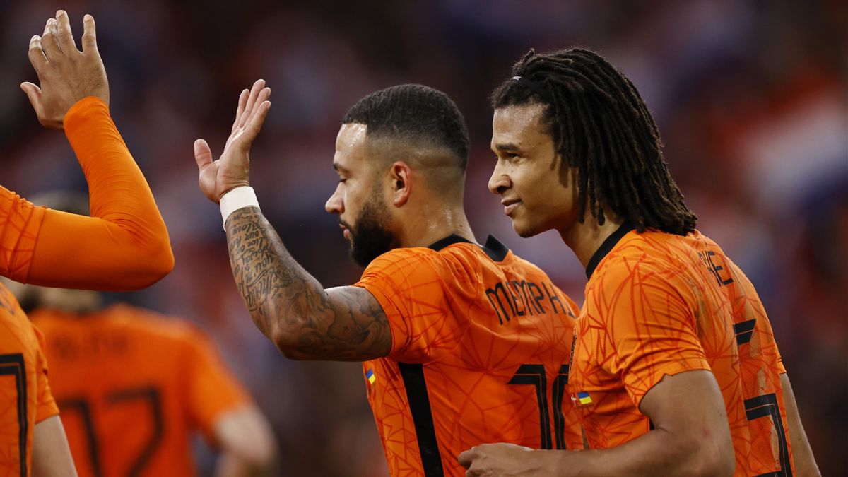 AMSTERDAM - (lr) Memphis Depay of Holland, Nathan Ake of Holland celebrate the 3-1 during the friendly match between the Netherlands and Denmark at the Johan Cruijff ArenA on March 26, 2022 in Amsterdam, Netherlands. ANP MAURICE VAN STEEN (Photo by ANP vi