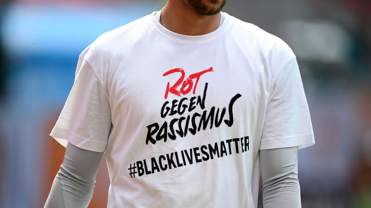 Bayern players and staff wore shirts with a message reading 'Red against racism #blacklivesmatter'