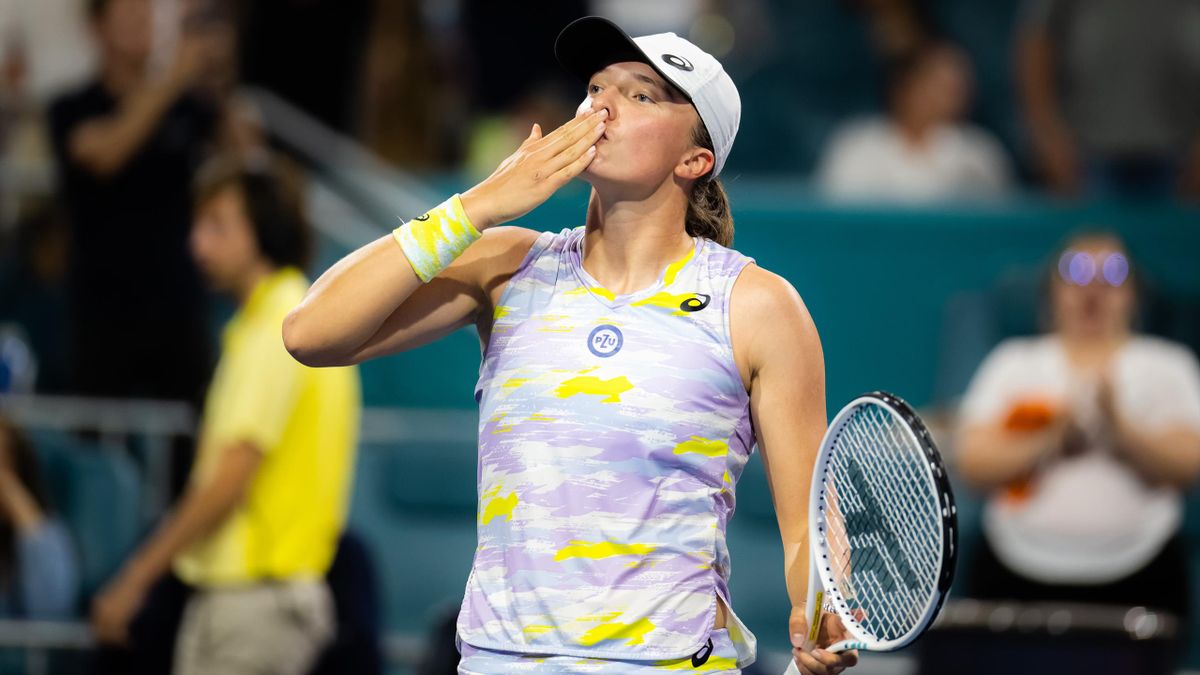 Iga Swiatek of Poland celebrates defeating Petra Kvitova of the Czech Republic in her quarter-final match on day 10 of the Miami Open at Hard Rock Stadium on March 30, 2022