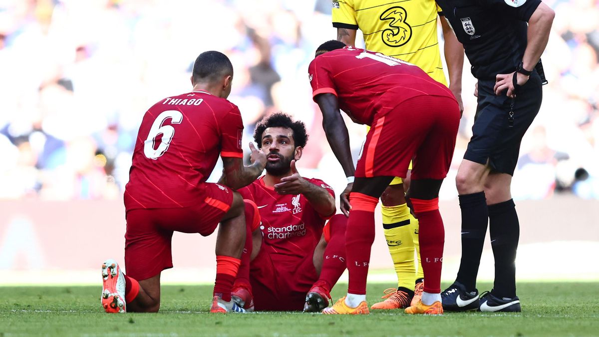 LONDON, ENGLAND - MAY 14: Mohamed Salah of Liverpool goes down injured during The FA Cup Final match between Chelsea and Liverpool at Wembley Stadium on May 14, 2022 in London, England. (Photo by Marc Atkins/Getty Images)