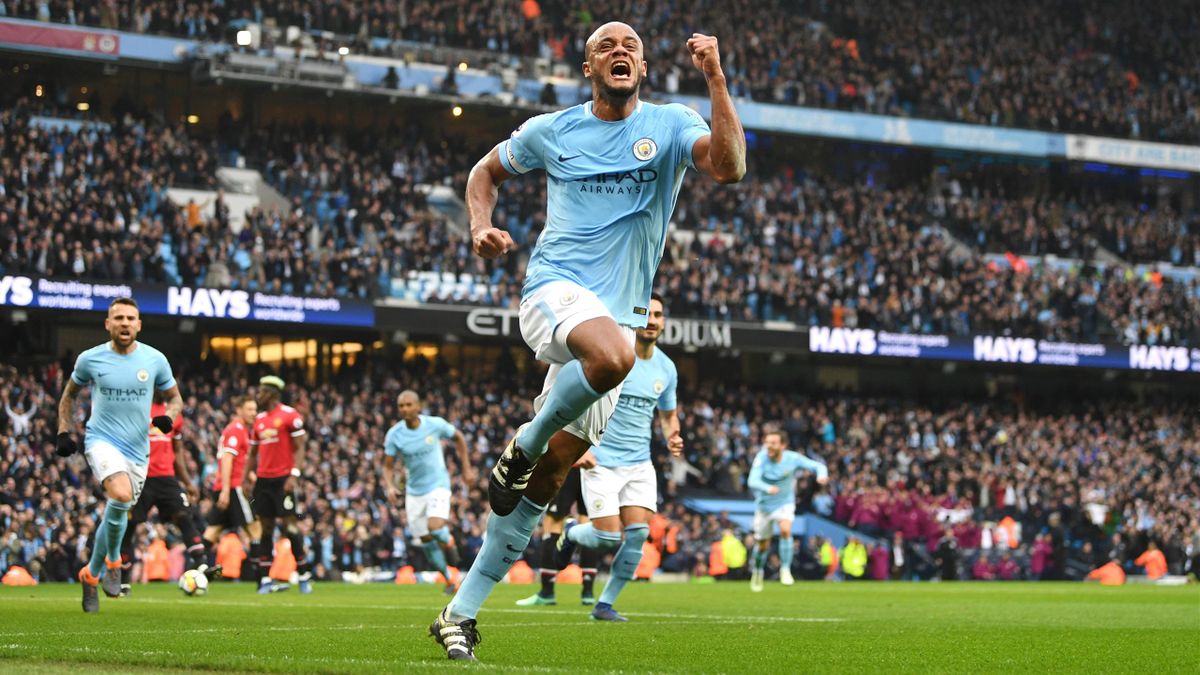 Vincent Kompany of Manchester City celebrates scoring a goal to make the score 1-0 during the Premier League match between Manchester City and Manchester United at Etihad Stadium on April 7, 2018 in Manchester, England.