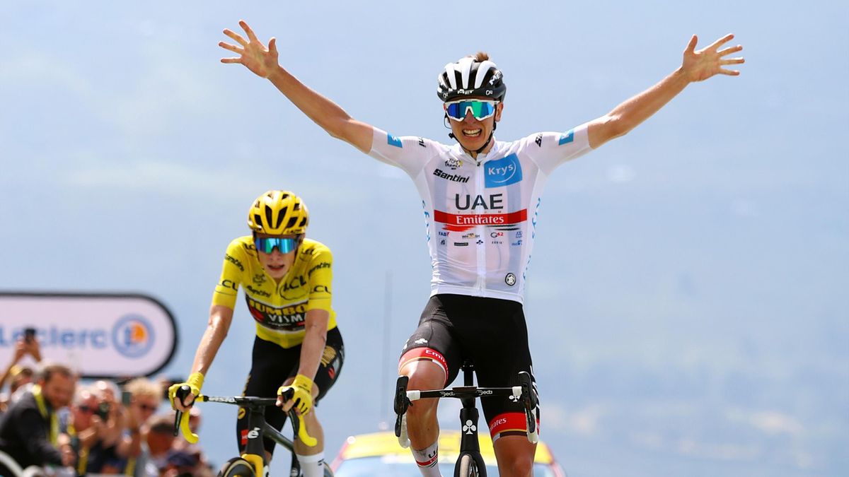 Tadej Pogacar of Slovenia and UAE Team Emirates - White Best Young Rider Jersey celebrates at finish line as stage winner ahead of Jonas Vingegaard Rasmussen of Denmark and Team Jumbo - Visma - Yellow Leader Jersey during the 109th Tour de France