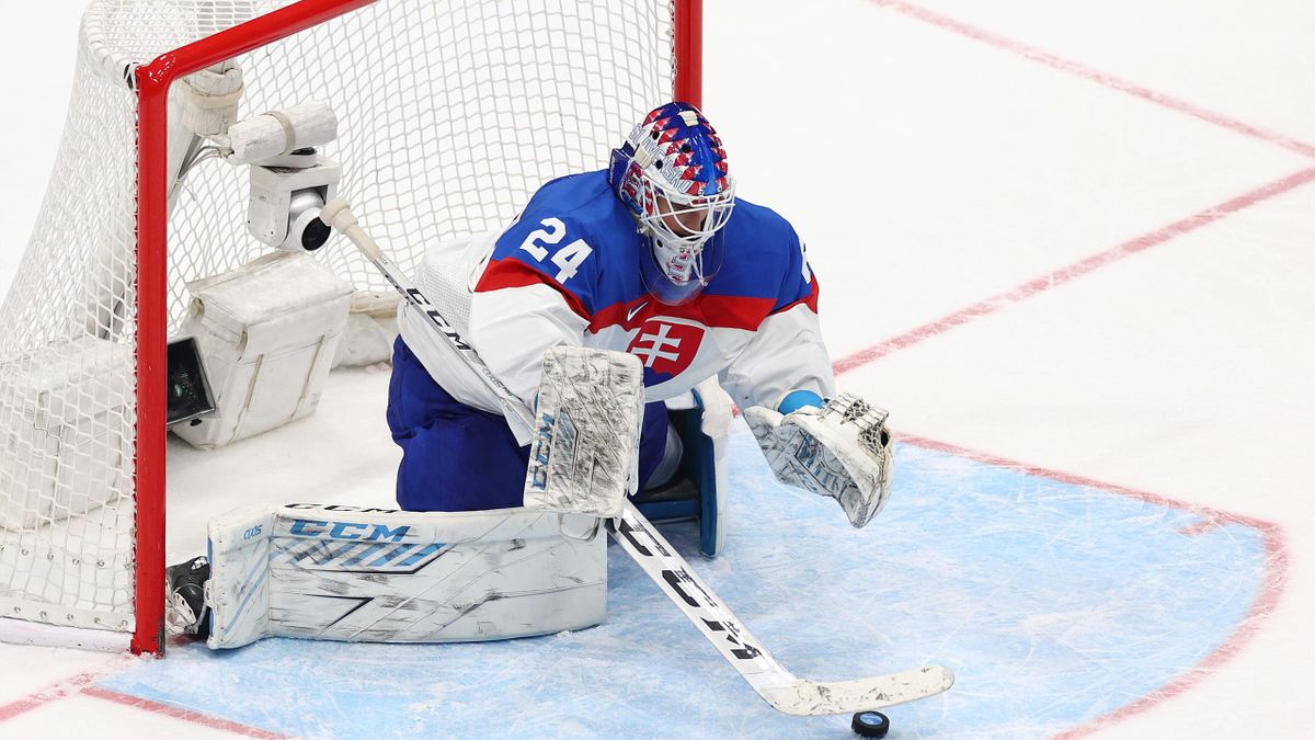 Goaltender Patrik Rybar #24 of Team Slovakia makes a save in the second period during the Men's Ice Hockey Playoff Semifinal match between Team Finland and Team Slovakia on Day 14 of the Beijing 2022 Winter Olympic Games at National Indoor Stadium.