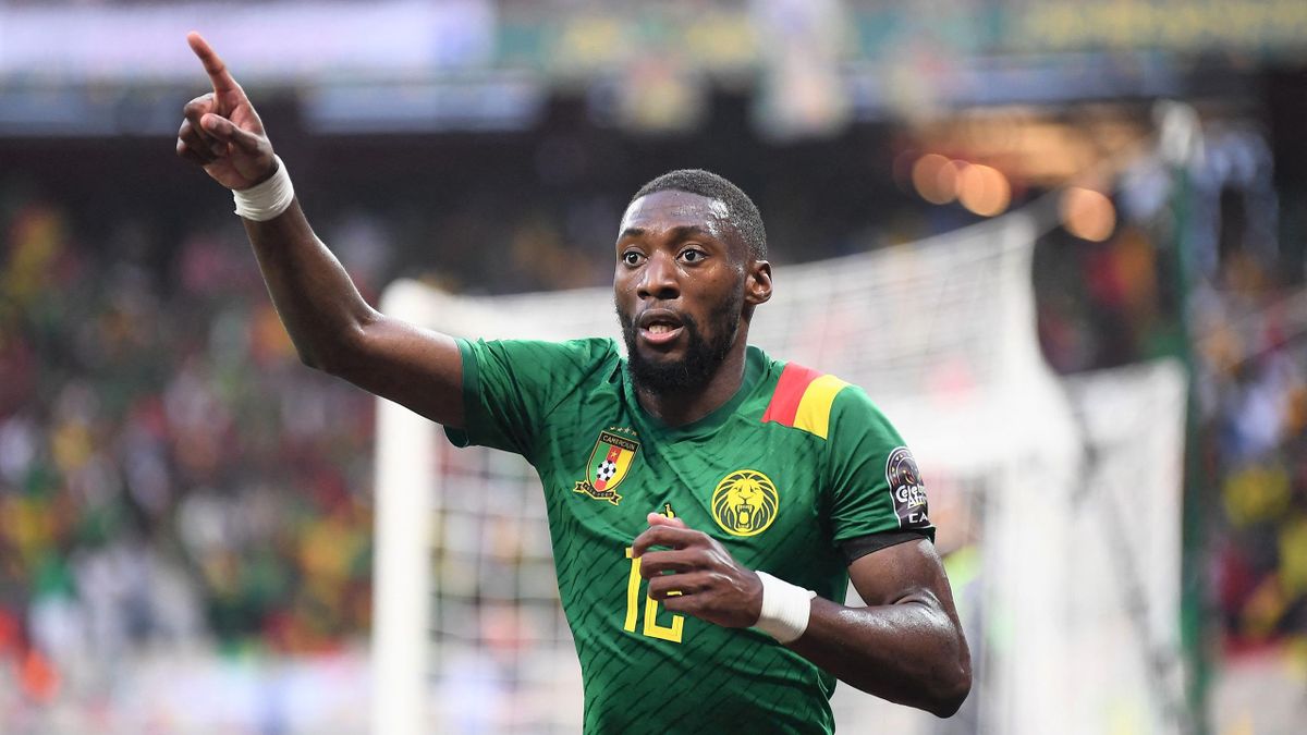 Cameroon forward Karl Toko Ekambi  celebrates after scoring during the Africa Cup of Nations (CAN) 2021 quarter final football match between Gambia and Cameroon at the Japoma Stadium in Douala on January 29, 2022