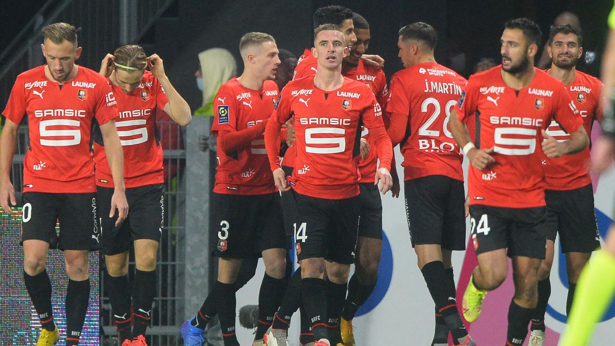 Rennes' French forward Martin Terrier (R) celebrates scoring his team's first goal during the French L1 football match between Stade Rennais Football Club and Montpellier Herault SC, at The Roazhon Park Stadium in Rennes, north-western France on November