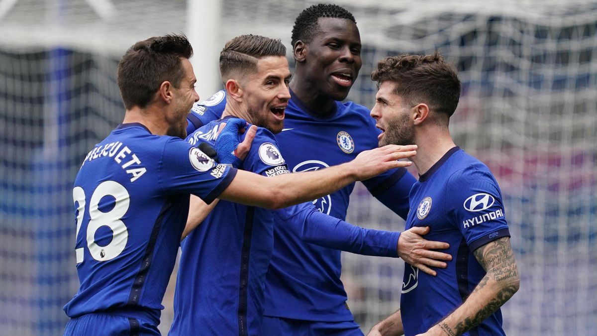 Chelsea's US midfielder Christian Pulisic celebrates with teammates after scoring his team's first goal during the English Premier League football match between Chelsea and West Bromwich Albion at Stamford Bridge in London on April 3, 2021