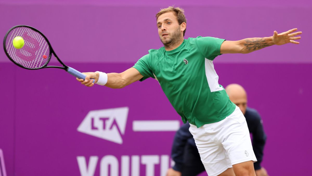 Daniel Evans of Great Britain plays a backhand during his Quarter-final match against Matteo Berrettini of Italy during Day 5 of The cinch Championships at The Queen's Club