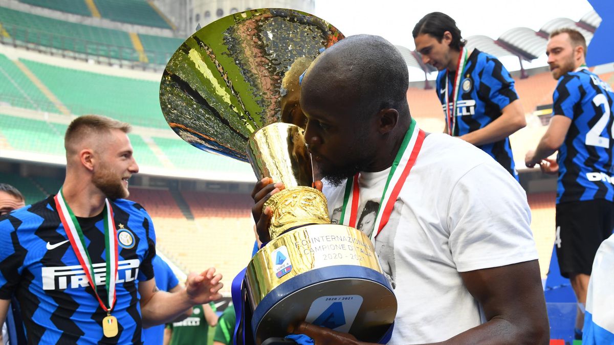 Romelu Lukaku of FC Internazionale poses with the trophy for the victory of "scudetto" at the end of the last Serie A match between FC Internazionale Milano and Udinese Calcio