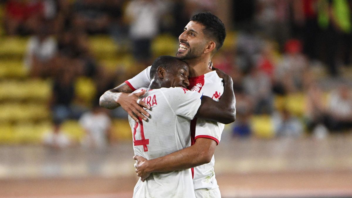 Monaco's Malian midfielder Mohamed Camara celebrates with Monaco's Chilean defender Guillermo Maripan during the French L1 football match between AS Monaco and Olympique Lyonnais