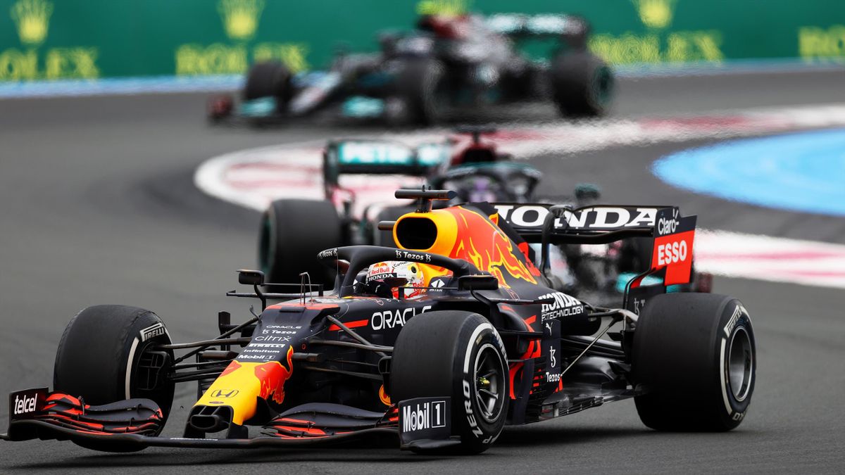 LE CASTELLET, FRANCE - JUNE 20: Max Verstappen of the Netherlands driving the (33) Red Bull Racing RB16B Honda leads Lewis Hamilton of Great Britain driving the (44) Mercedes AMG Petronas F1 Team Mercedes W12 during the F1 Grand Prix of France at Circuit