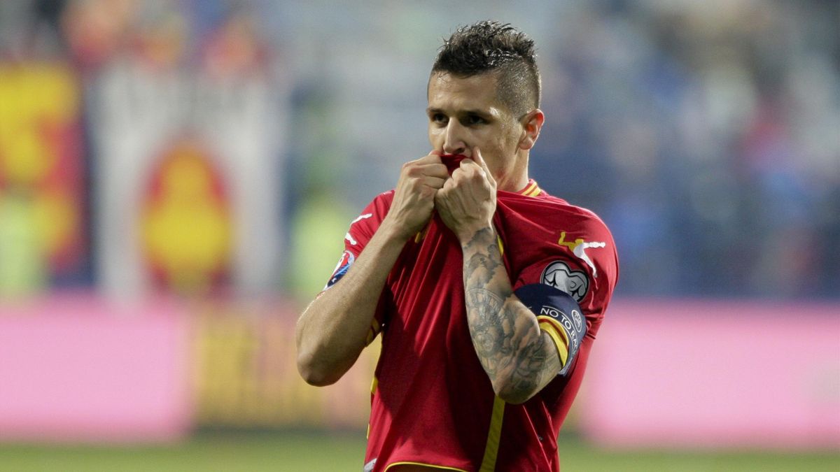 Montenegro's Stevan Jovetic kisses his jersey
