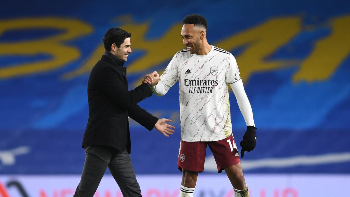 Arsenal manager Mikel Arteta celebrates with Pierre-Emerick Aubameyang after the Premier League match between Brighton & Hove Albion and Arsenal at American Express Community Stadium on December 29, 2020 in Brighton, England.