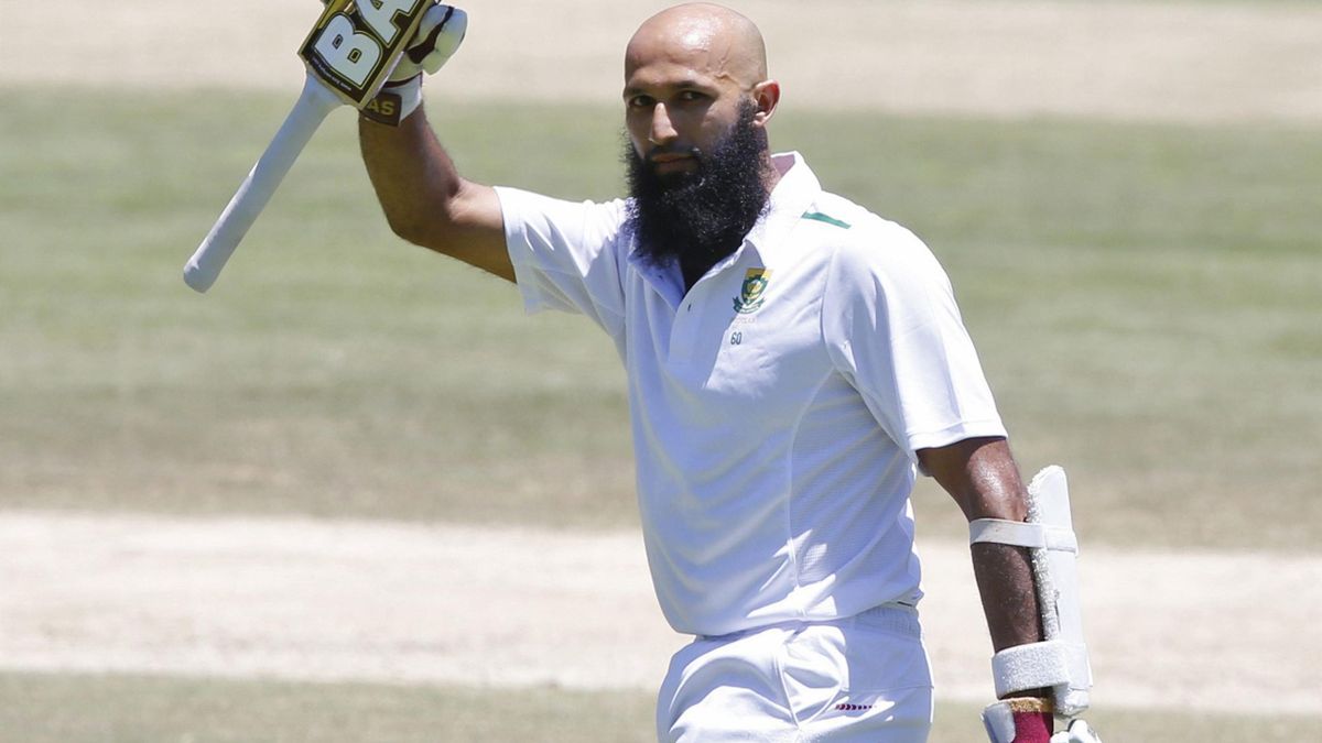 South Africa's Hashim Amla celebrates scoring a double century during the second cricket test match against England in Cape Town, South Africa, January 5, 2016.