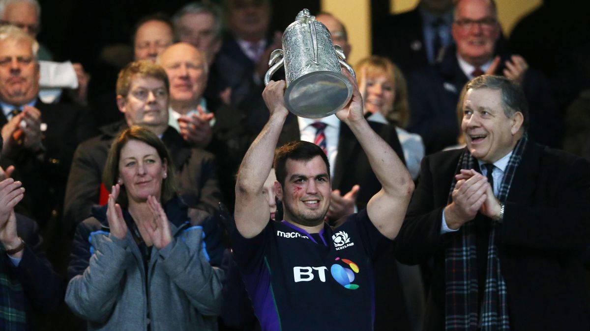 Stuart McInally of Scotland poses with the Calcutta Cup trophy after the Guinness Six Nations match between England and Scotland at Twickenham Stadium