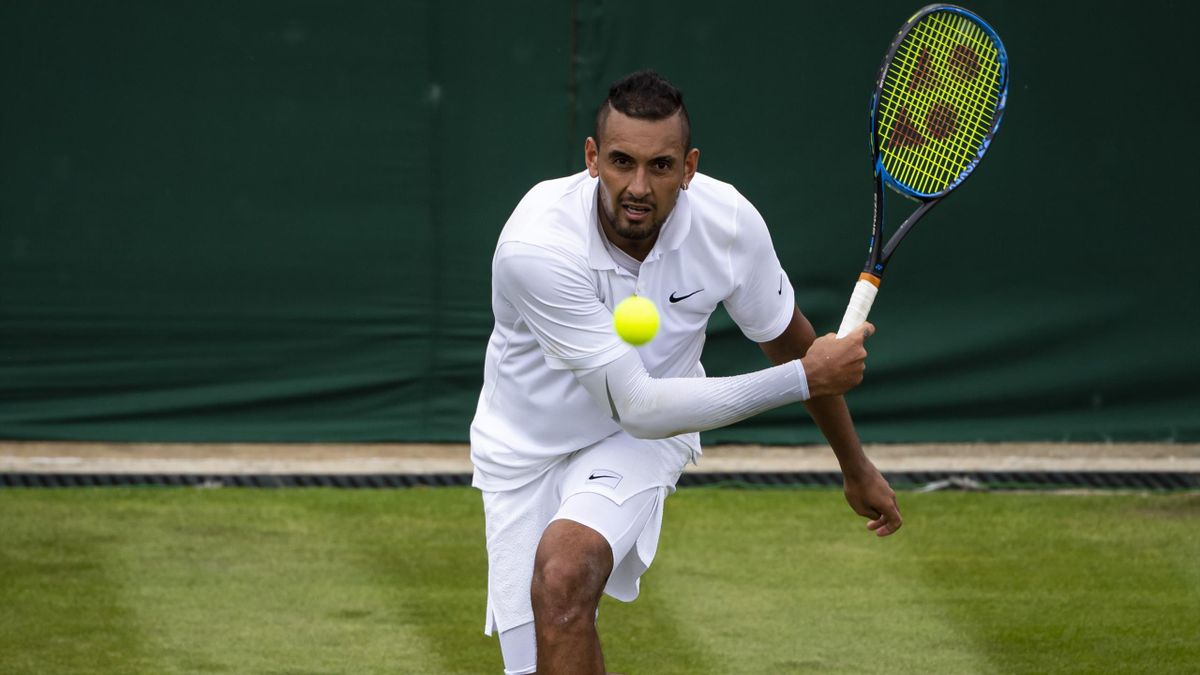 Nick Kyrgios of Australia hits a forehand against Jordan Thompson of Australia during Day 2 of The Championships - Wimbledon 2019 at All England Lawn Tennis and Croquet Club on July 02, 2019 in London, England.