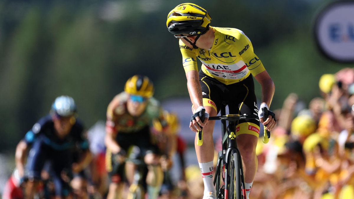 UAE Team Emirates team's Slovenian rider Tadej Pogacar wearing the overall leader's yellow jersey cycles to the finish line of the 10th stage of the 109th edition of the Tour de France cycling race, 148,1 km between Morzine and Megeve, in the French Alps,