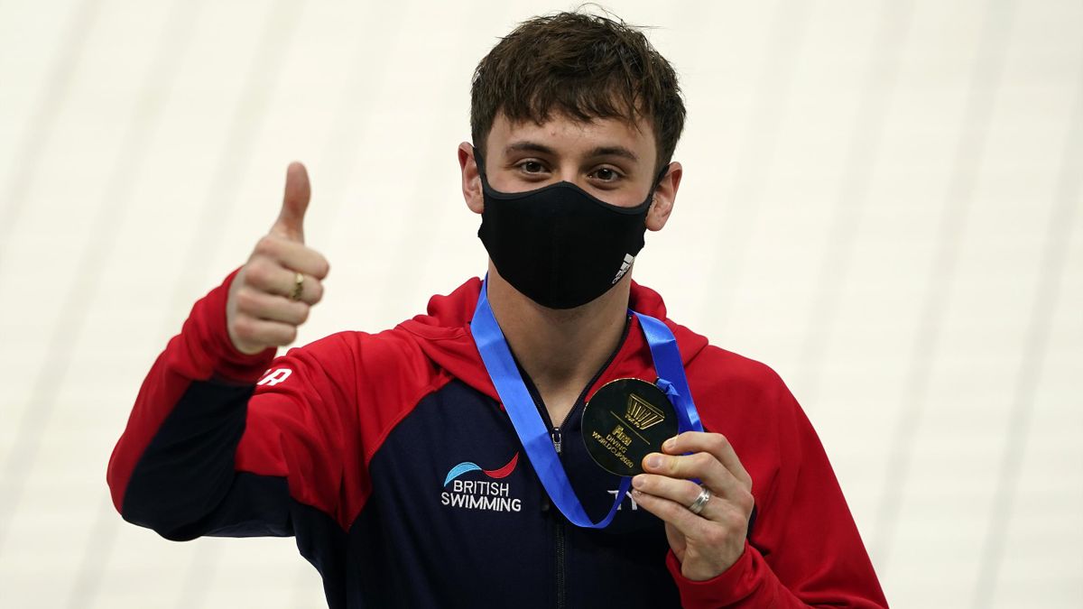Tom Daley of Great Britain poses with his gold medal after winning the Men's 10m Platform final on day four of the FINA Diving World Cup at the Tokyo Aquatics Centre on May 04, 2021