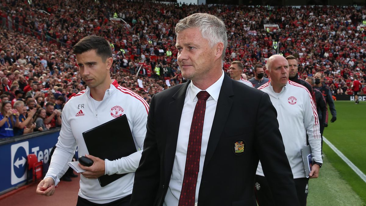 Manager Ole Gunnar Solskjaer of Manchester United walks out ahead of the Premier League match between Manchester United and Newcastle United at Old Trafford on September 11, 2021 in Manchester, England.