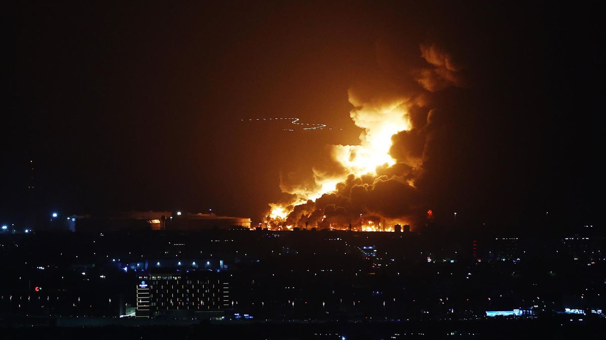An Aramco oil depot close to the circuit is seen in flames following an incident during practice ahead of the F1 Grand Prix of Saudi Arabia at the Jeddah Corniche Circuit on March 25, 2022 in Jeddah, Saudi Arabia.