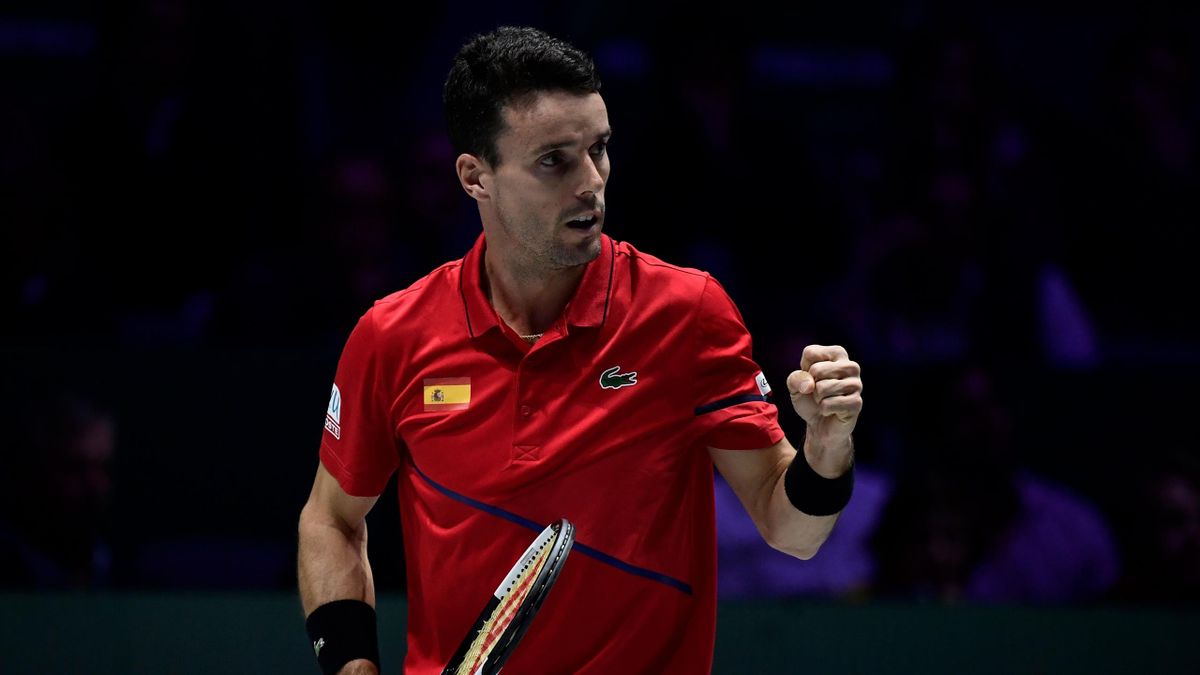 Spain's Roberto Bautista Agut celebrate winning a point against to Canada's Felix Auger-Aliassime during the final singles tennis match between Canada and Spain at the Davis Cup Madrid Finals 2019 in Madrid