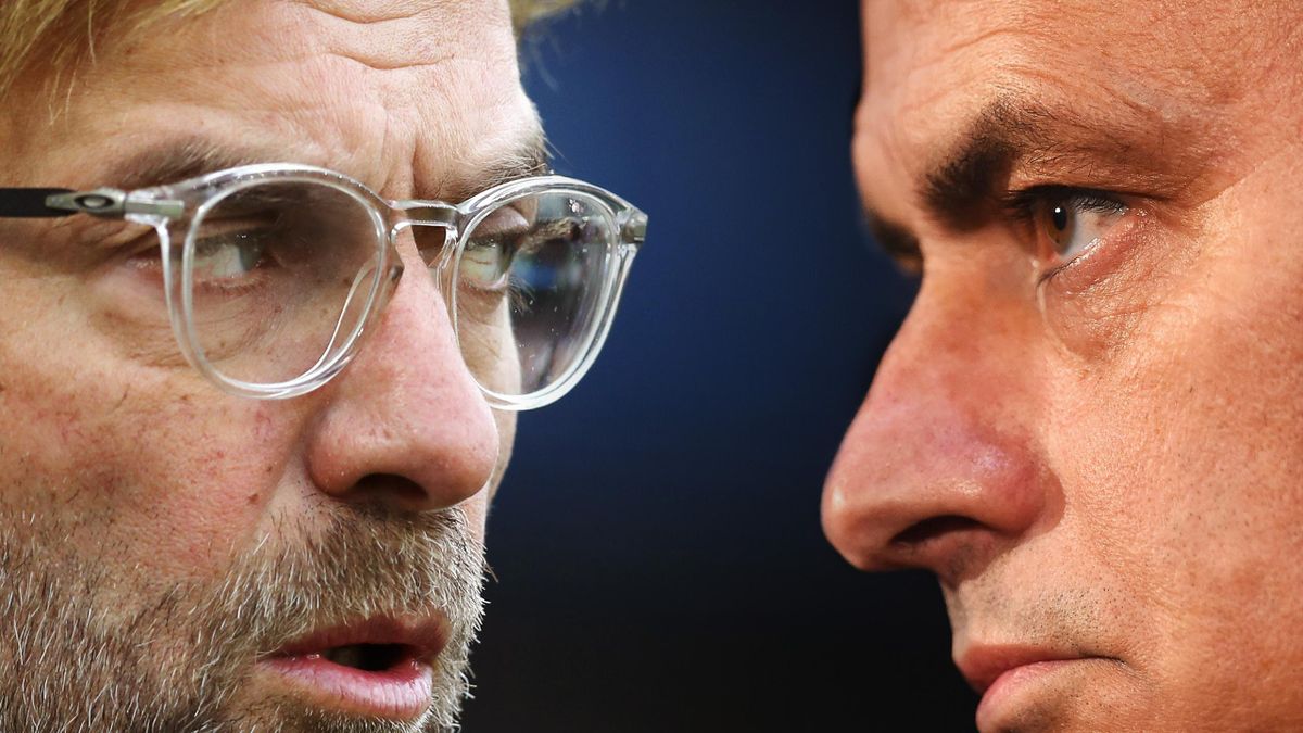 Jurgen Klopp, Manager of Liverpool (L) and Jose Mourinho, manager of Manchester United