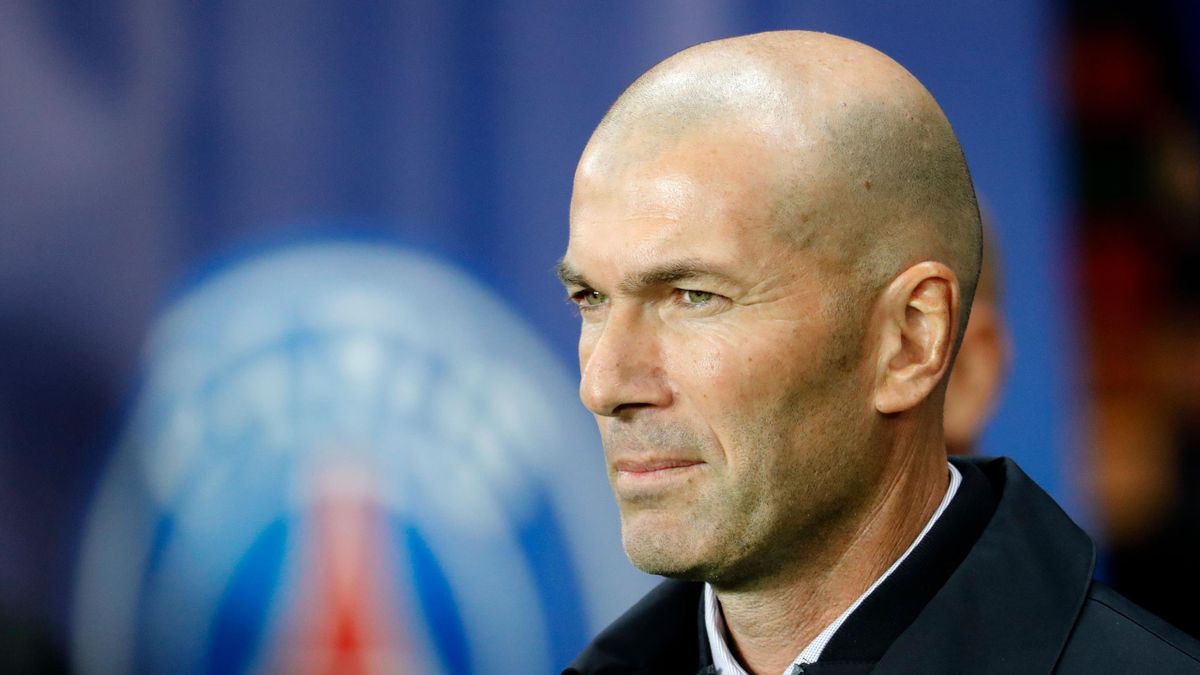 Real Madrid's French coach Zinedine Zidane looks on prior the start of the UEFA Champions league Group A football match between Paris Saint-Germain and Real Madrid, at the Parc des Princes stadium, in Paris, on September 18, 2019
