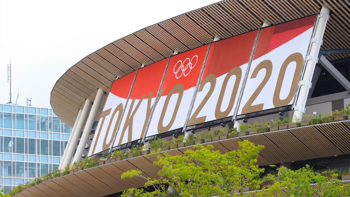 TOKYO, JAPAN - 2021/06/25: A view of the Olympic Stadium with Tokyo 2020 Olympic Games branding. (Photo by Stanislav Kogiku/SOPA Images/LightRocket via Getty Images)