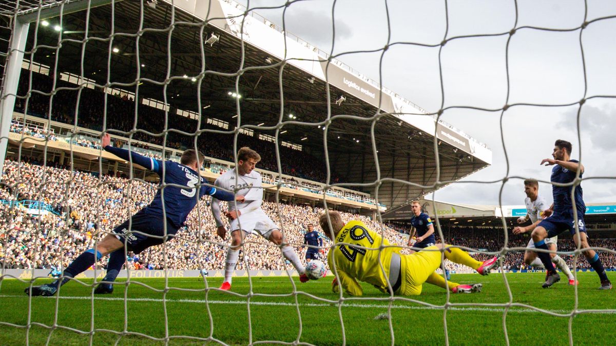 Leeds United's Patrick Bamford scores his side's second goal during the Sky Bet Championship match between Leeds United and Huddersfield Town at Elland Road on March 7, 2020