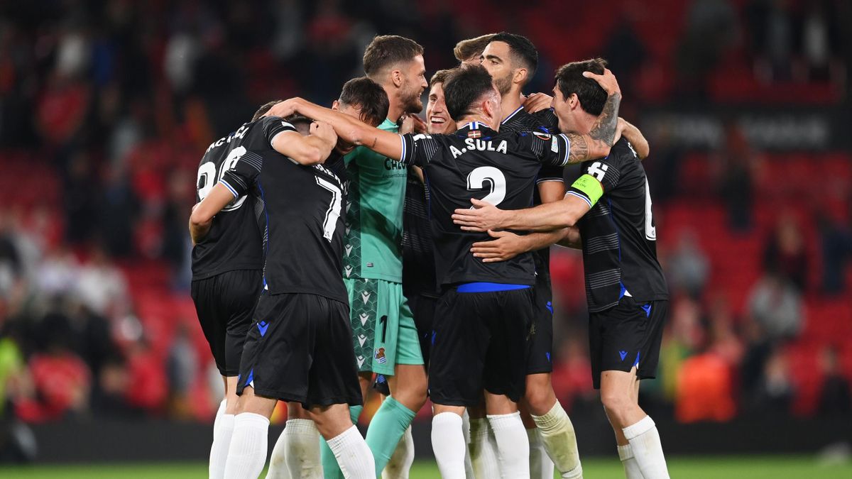 Real Sociedad players celebrate victory after the final whistle in the UEFA Europa League group E match between Manchester United and Real Sociedad at Old Trafford