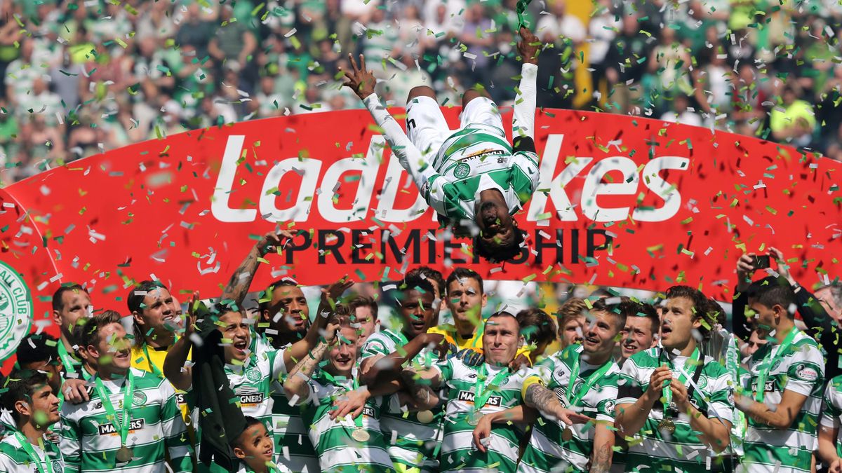 Efe Ambrose celebrates with team mates at the end of the game.