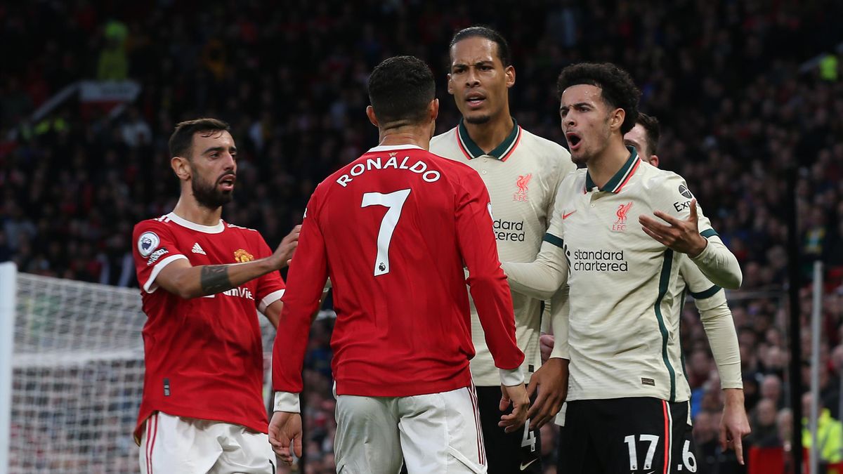 Cristiano Ronaldo of Manchester United clashes with Trent Alexander-Arnold of Liverpool during the Premier League match between Manchester United and Liverpool at Old Trafford on October 24, 2021 in Manchester, England.