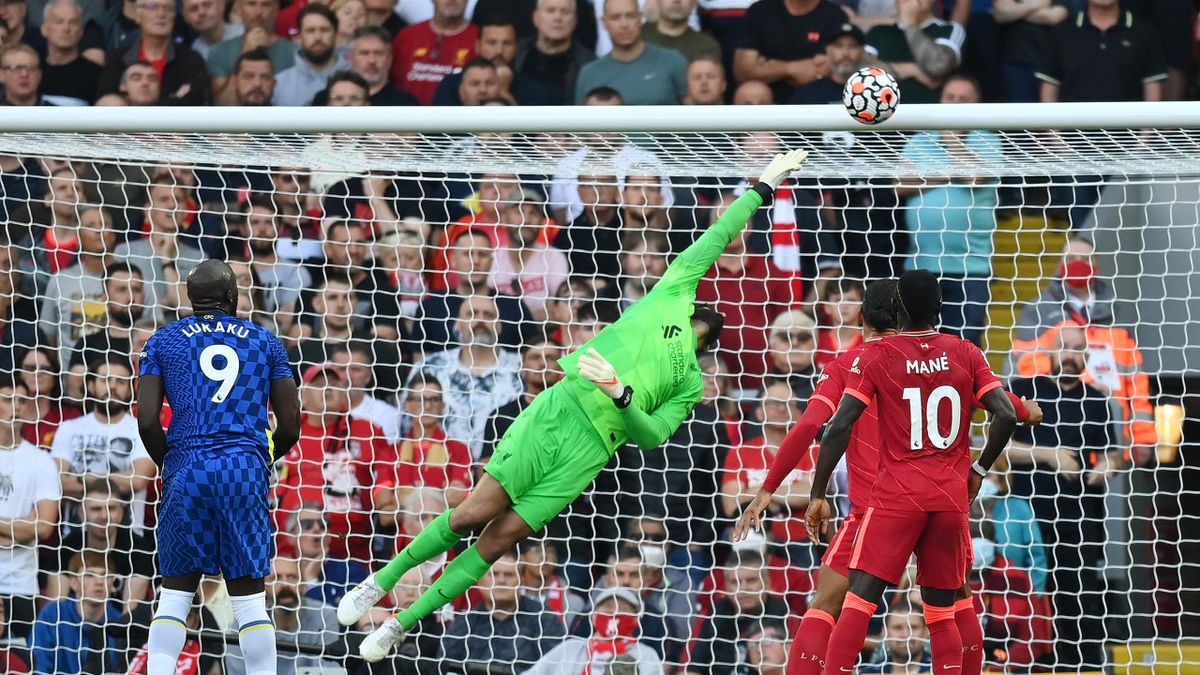 Liverpool goalkeeper Alisson Becker dives for the ball, Liverpool v Chelsea, Premier League, Anfield, Liverpool, August 28, 2021