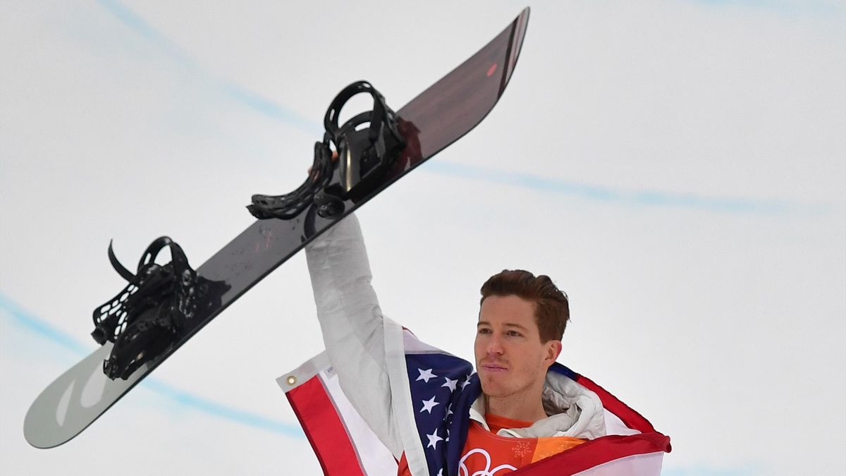 US Shaun White celebrates on the podium during the victory ceremony after the final of the men's snowboard halfpipe at the Phoenix Park during the Pyeongchang 2018 Winter Olympic Games
