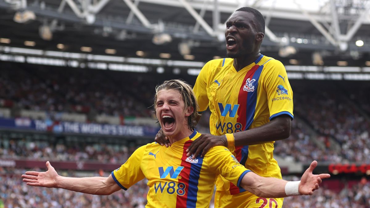Conor Gallagher of Crystal Palace celebrates after scoring with team mate Christian Benteke during the Premier League match against West Ham United, London Stadium, August 28, 2021
