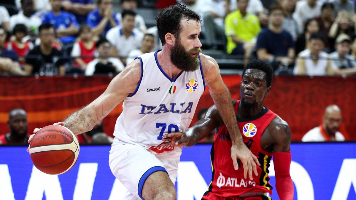 #70 Luigi Datome of the Italy National Team in action against #1 Gerson Domingos of the Angola National Team during the 1st round of 2019 FIBA World Cup at GBA International Sports and Cultural Center on September 02, 2019 in Foshan, China.