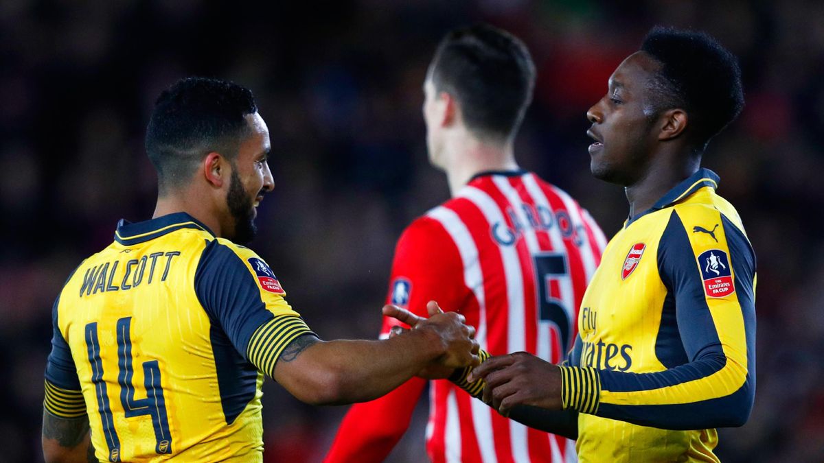 Arsenal's Theo Walcott and Danny Welbeck celebrate