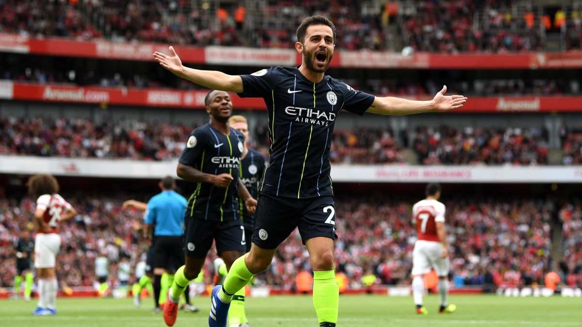 Bernardo Silva of Manchester City celebrates scoring his team's second goal during the Premier League match between Arsenal FC and Manchester City at Emirates Stadium on August 12, 2018 in London, United Kingdom.